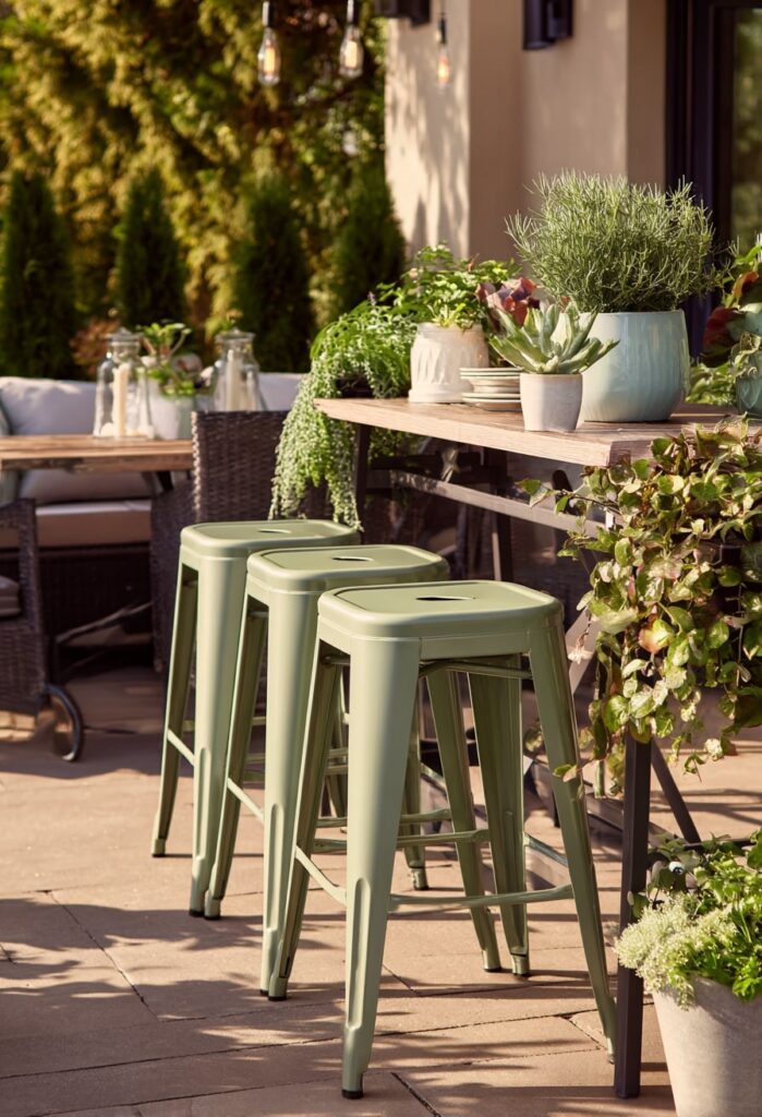 15. Garden Bar Setup with Green Metal Stools