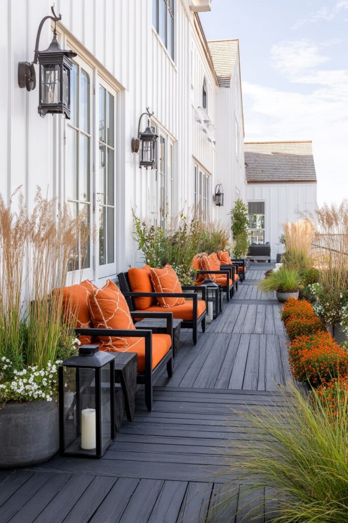 15. Crisp Porch Seating with Pops of Orange on Black Decking