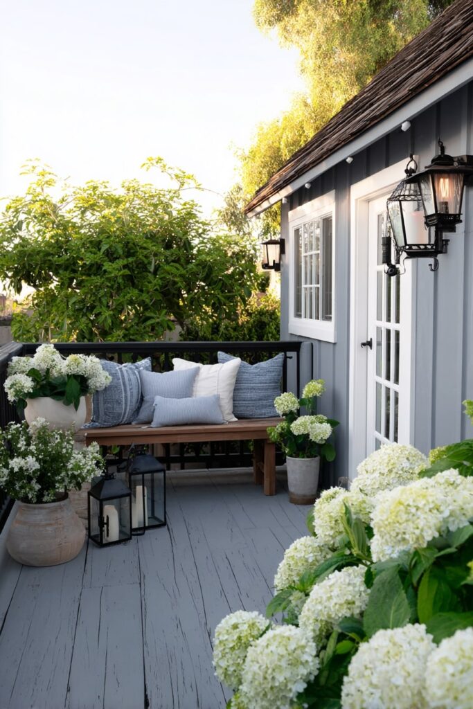 13. Cottage-Style Porch with Soft Black Accents