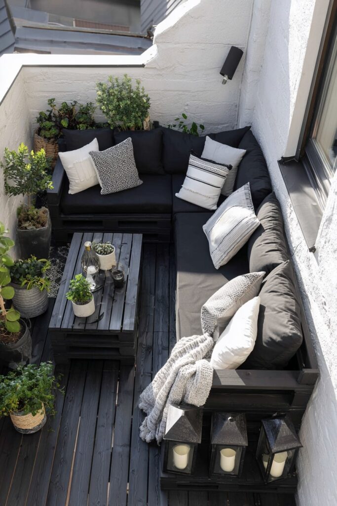 13. Compact Black Decking Corner with Monochrome Flair