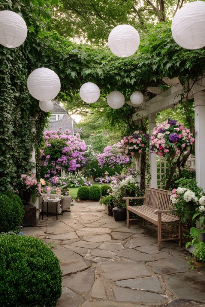 6. Garden Walkway with Hanging Lanterns and Blooming Arches