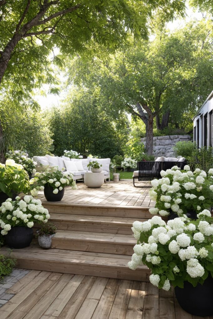 16. Garden Decking Corner with Soft Neutrals and Hydrangeas