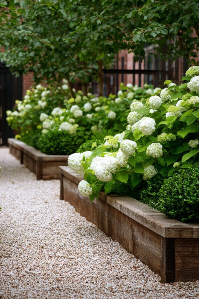 10. Wooden Raised Border with Hydrangeas and Bark Base