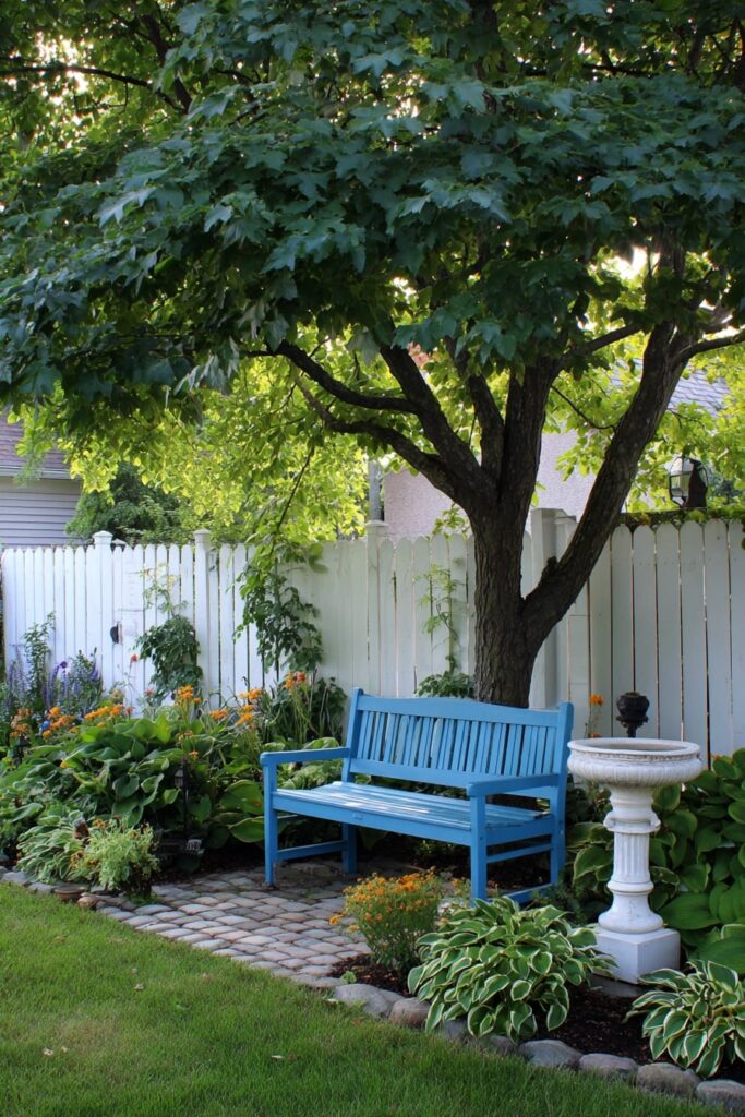 Bright Blue Bench Under a Shady Tree